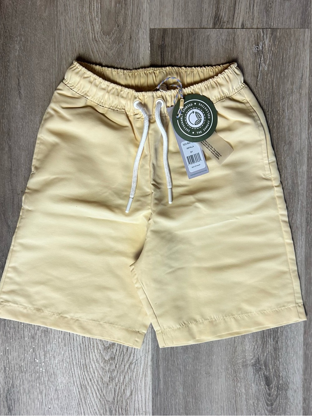 Kid’s Drawstring Swim Shorts in Pale Yellow - Picture 7 of 10